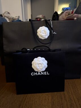 CHANEL Black Shopping Bag with White Camellia Accents